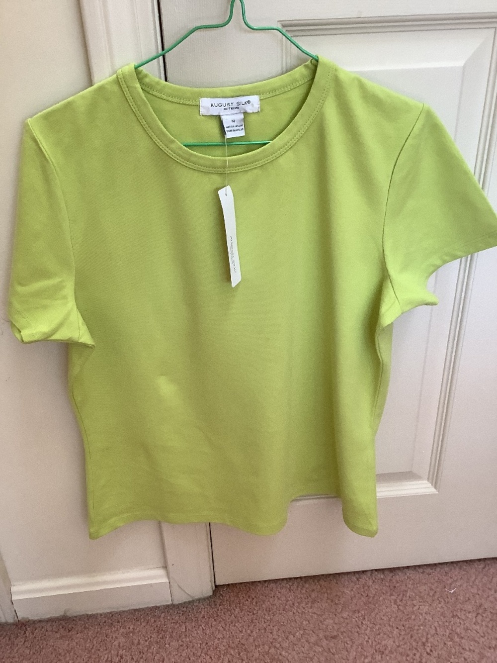 Light green August Silk medium top.